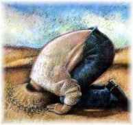 testa_sotto_la_sabbia